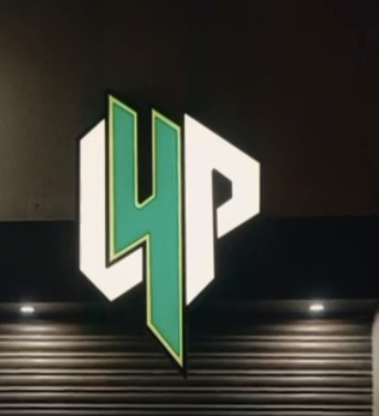 YP green and white backlit LED logo sign